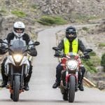 bikers on bikes wearing the Helite Touring grey biker jacket and Turtle 2 Safety vest.