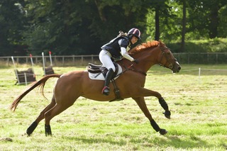 Flo Burnop Horse Eventing with helite Safety vest